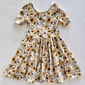 Girlhood Sunflower Dress | Short Sleeve Twirl Dress | Cream Floral | 12–18M